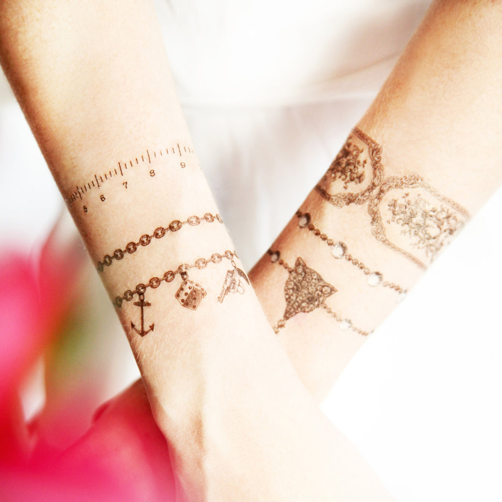 16 Cute Charm Bracelet Tattoos