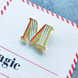 letter M enamel pin with pin card